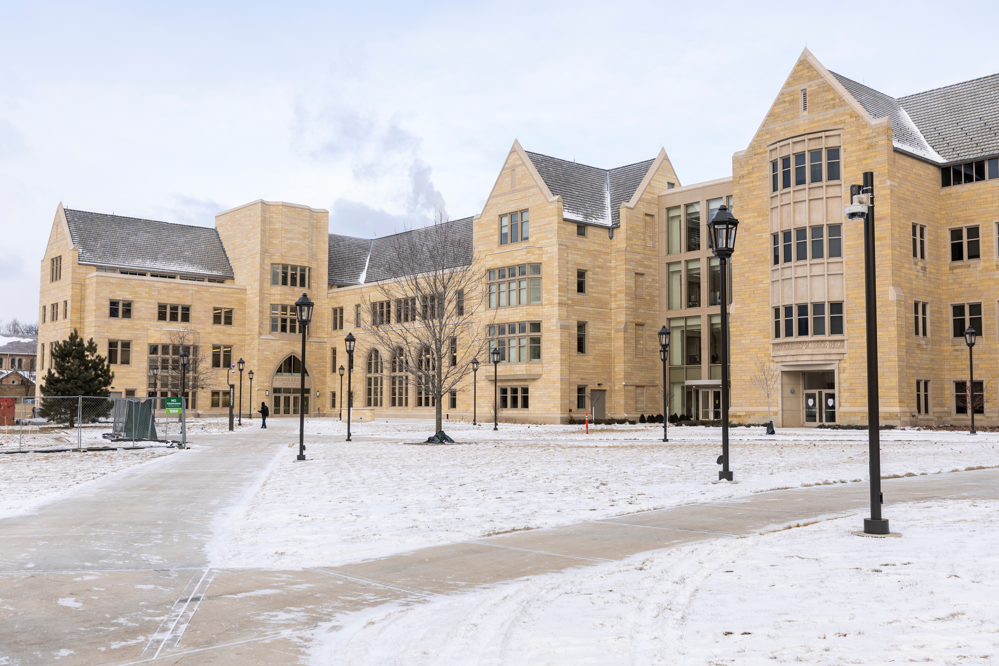 Campus scene of the new Schoenecker Center on a snowy day