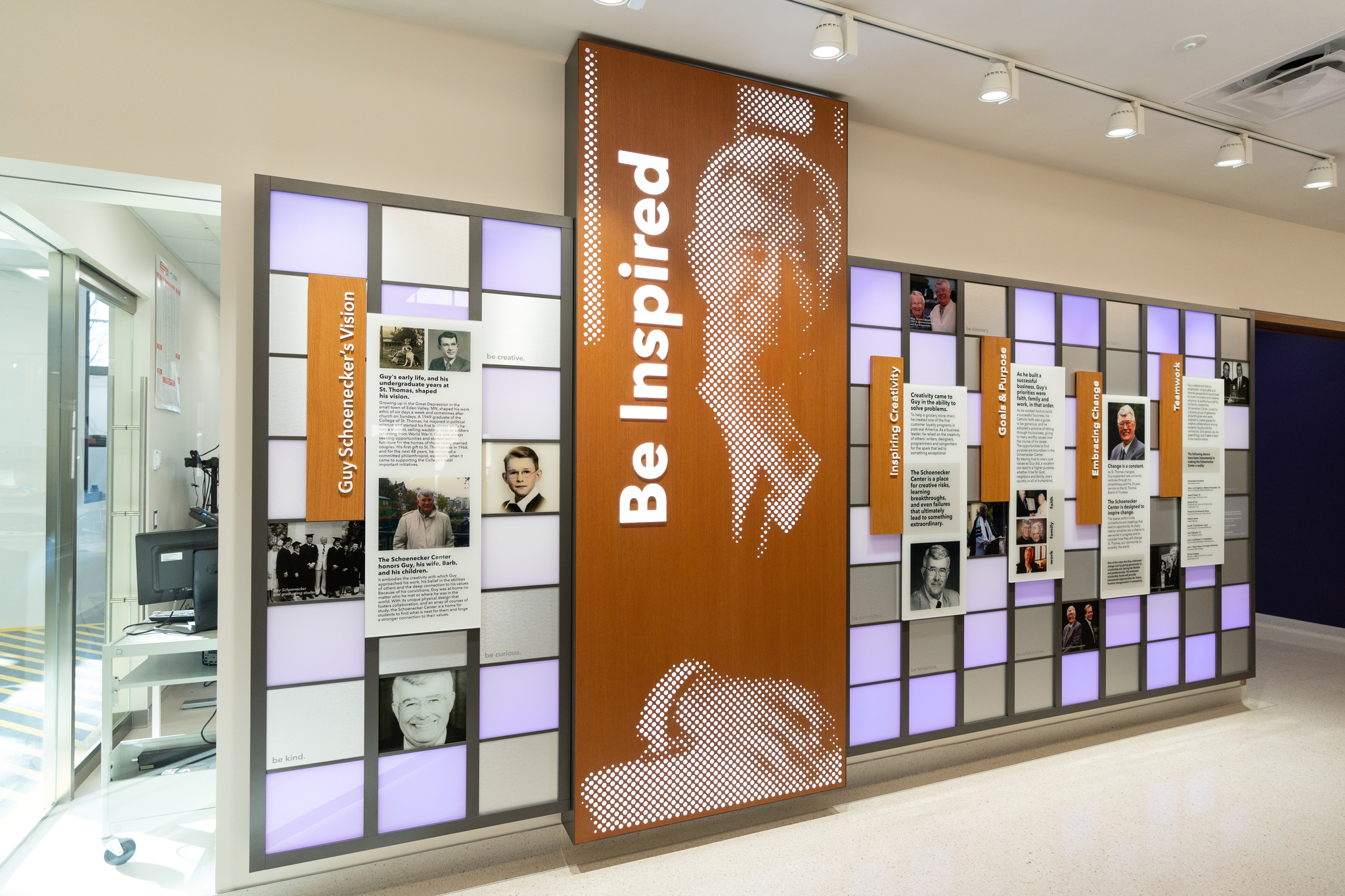 The donor wall installation highlighting the contributions of Guy Schoenecker and his family in the Schoenecker Center